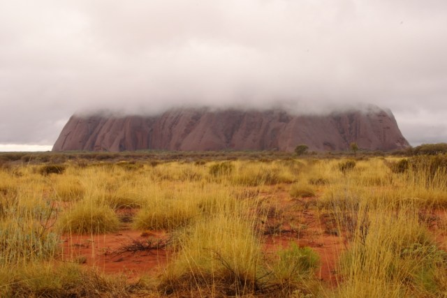 Storm brewing over the Rock. Ayer's Rock/Uluru, the largest monolith in the world. Photo: Bryan Clode.